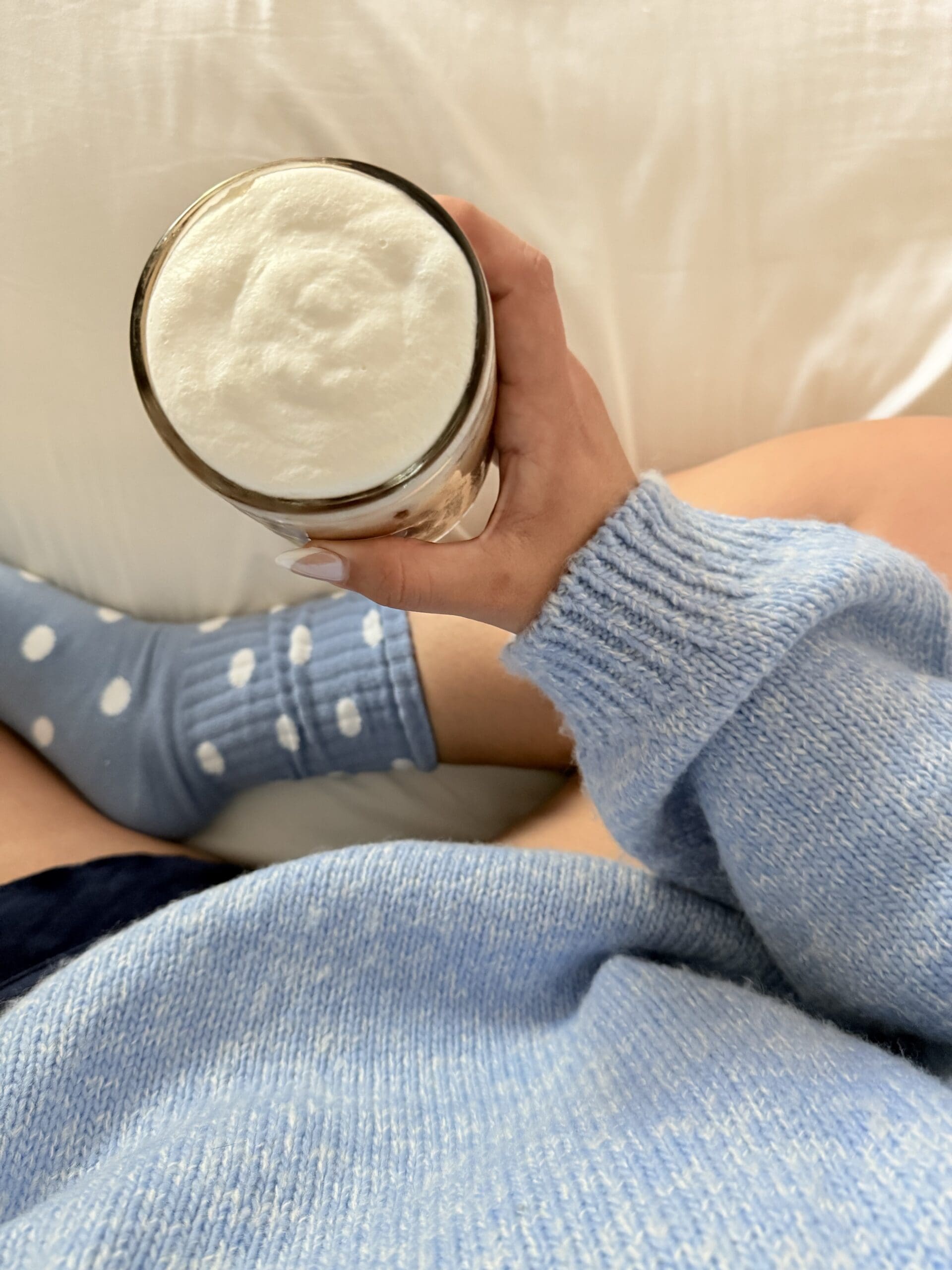cozy blue sweater with blue socks and coffee for a post about 5 things to be afraid to admit about sobriety