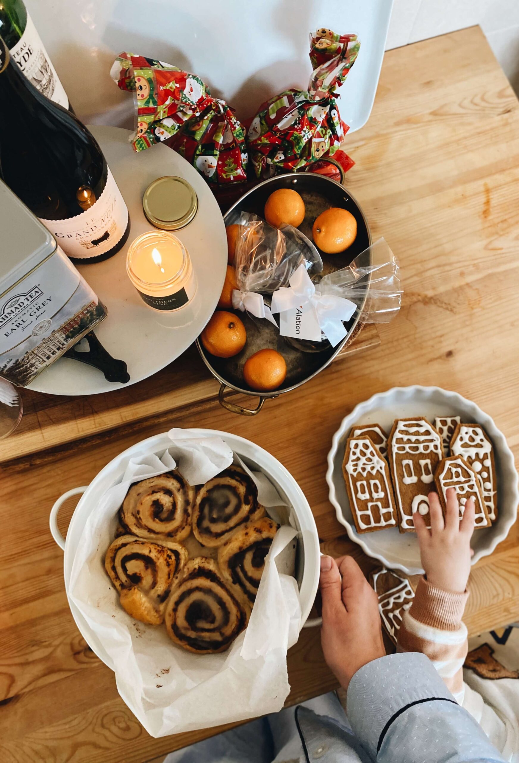 An overhead shot of holiday baking essentials on a flour-dusted surface, capturing the cozy magic of a fully present sober Christmas.
